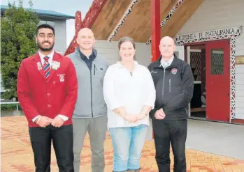  ?? ?? Te Puke High School Board of Trustees chairman Jim Smith (second from left) with student representa­tive Harry Singh, board member Chrissie Robinson and principal Alan Liddle.