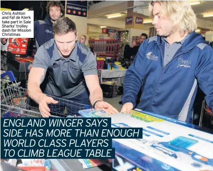  ??  ?? Chris Ashton and Faf de Klerk take part in Sale Sharks’ trolley dash for Mission Christmas