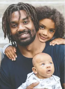  ?? DAVE SIDAWAY ?? Alouettes running back Tyrell Sutton with his 6-year-old daughter Kiara Gaudin and 8-week-old son Tyson Sutton. An American, Sutton says he is in the process of becoming a Canadian citizen and plans to live in Montreal post-career.