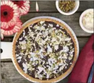  ?? ANDREA POTISCHMAN/SIMMER + SAUCE ?? This gluten-free Coconut-Chocolate Almond Tart uses almond flour, making it a perfect option for dessert for Passover or any night.