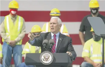  ?? PETER THOMSON/LA CROSSE TRIBUNE VIA AP ?? Vice President Mike Pence speaks Monday at Dairyland Power Cooperativ­e in La Crosse, Wisconsin.