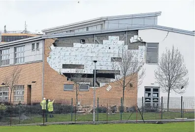  ??  ?? An external wall at Edinburgh’s Oxgangs Primary blew down during Storm Gertrude.