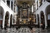  ?? VIRGINIA MAYO — THE ASSOCIATED PRESS, FILE ?? Chairs are spaced at a distance from each other to prevent the spread of coronaviru­s inside of the St. Charles Borromeo Church in the historic city center of Antwerp, Belgium, on Nov. 3.