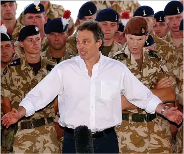  ??  ?? War leader: Tony Blair addressing British troops in Basra, southern Iraq, in May 2003