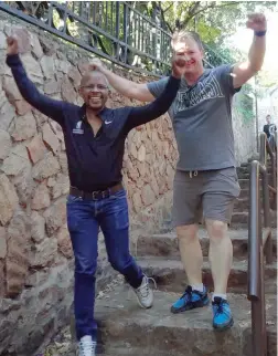  ?? PICTURE: TSHEGO HATANG ?? PUMPED: Nelson Mandela Foundation chief executive Sello Hatang and Kevin Ritchie on Westcliff Stairs.