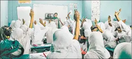  ??  ?? Students in a Hyderabad classroom talk to Ruth Sequeira over the laptop, one of the 15 women profiled in Varsha Adusumilli’s book