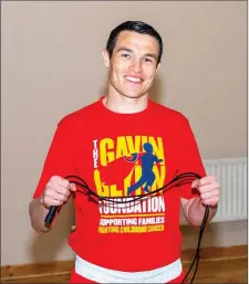  ??  ?? Four Kings head coach Stephan Coughlan getting prepared for his 20 three-minute rounds of skipping in St. Patrick’s Hall in Kilcoole.