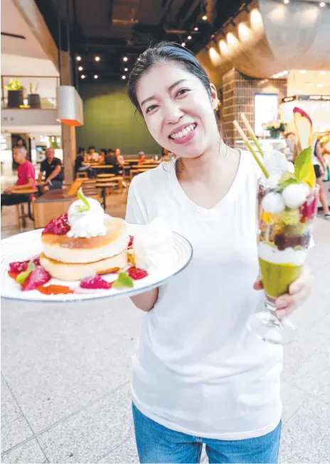  ?? Picture: Tim Marsden ?? Mari Kamada, 30, from Broadbeach with Japanese fare from Koto Sanpo in Pacific Fair.