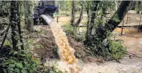  ?? PHOTO: GETTY IMAGES ?? Water is pumped out of Tham Luang Nang Non cave into a lake on the foot of Doi Nang Non mountain range, Thailand on Saturday.