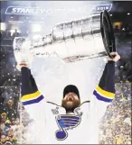  ?? Bruce Bennett / Getty Images ?? Alex Pietrangel­o, of the St. Louis Blues, celebrates with the Stanley Cup after defeating the Boston Bruins to win the 2019 NHL Stanley Cup in Boston on Wednesday. NBC Sports drew a record audience for the game.