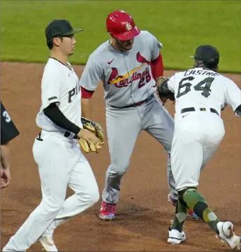  ?? Associated Press ?? Pirates second baseman Rodolfo Castro (64) puts the tag on St. Louis Cardinals’ Nolan Arenado (28) to end the top of the fourth inning Wednesday at PNC Park.