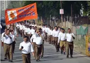  ?? ?? RSS volunteers participat­e in a march on the occasion of Hindu New Year, in Ghaziabad on 3 April. ANI