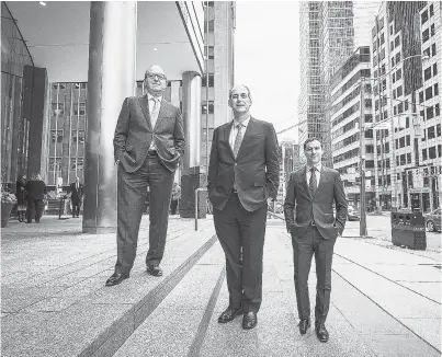  ?? AARON VINCENT ELKAIM FOR NATIONAL POST ?? Frank Mayer, chairman of Vision Capital Corp., left; Jeffrey Olin, president and CEO, middle; and Andrew Moffs, senior vice-president, focus on gaining real estate exposure through the stock market, which is cheaper than buying property.