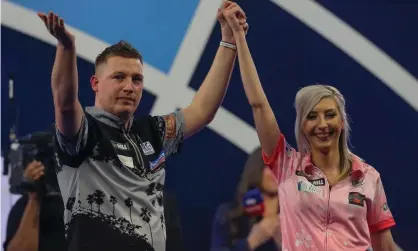  ??  ?? Chris Dobey with Fallon Sherrock after their match at Alexandra Palace. Photograph: Ian Stephen/ProSports/Rex/Shuttersto­ck