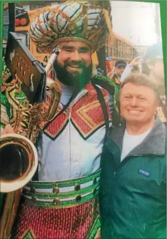  ?? DIGITAL FIRST MEDIA FILE ?? Eagles center and Mummers impersonat­or Jason Kelce, left, next to costumer James May, found something to celebrate this Mummers season as the Eagles got back into the playoffs.