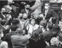  ?? Anna Moneymaker / Getty Images ?? Speaker Nancy Pelosi cheers with fellow House Democrats after the passage of the Build Back Better Act on Nov. 19.