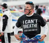  ?? STEVE HELBER THE ASSOCIATED PRESS FILE PHOTO ?? Bubba Wallace, NASCAR’s only Black full-time driver, successful­ly pushed the stock car series to ban the Confederat­e flag at its venues less than two weeks ago.