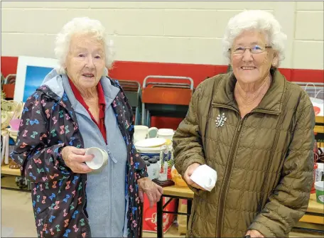  ??  ?? Bernadette O’Toole and Lily Vickers at the annual bargain hunt in aid of Wicklow Methodist Church in the church hall.