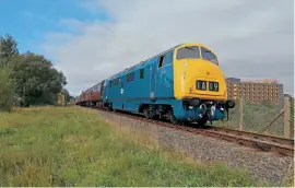  ?? ELR ?? The East Lancashire Railway Diesel Group’s WR Class 42 Warship diesel hydraulic D832 Onslaught running as scrapped sister D818 Glory in BR blue livery.