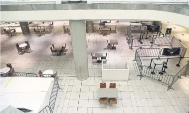  ?? STEVE RUSSELL TORONTO STAR FILE PHOTO ?? Tables in the food court of the Eaton Centre have been physically distanced as Toronto moved into Stage 3 of reopening.