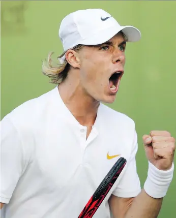  ?? TIM IRELAND/THE ASSOCIATED PRESS ?? Denis Shapovalov celebrates a point en route to defeating Jeremy Chardy of France 6-3, 3-6, 7-5, 6-4 on Tuesday at Wimbledon. It was his first main draw win at the London Grand Slam.