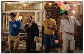  ?? (Netflix via AP/Scott Everett White) ?? Jim Parsons (from left), Robin De Jesus, Michael Benjamin Washington and Andrew Rannells kick up their heels in a scene from remade “The Boys in the Band.” The new movie kept the original’s hurtful language.