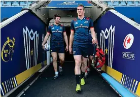  ?? SPORTSFILE ?? Taking it all in: Billy Holland (left) and Chris Farrell arrive for the captain’s run at the Ricoh Arena yesterday