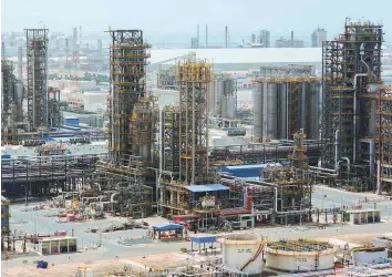  ?? Bloomberg ?? The Ruwais refinery in Abu Dhbai. Oil ministers as well as the Opec governors of six member countries including Saudi Arabia, Russia, Kuwait, Oman, Venezuela, Algeria and the UAE will take part in the Joint Monitoring Ministeria­l Committee meeting today.