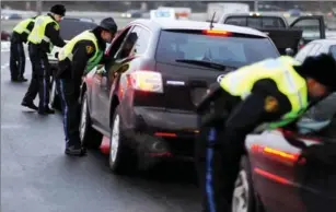  ?? CARLOS OSORIO, TORONTO STAR ?? The proposed law includes new alcohol screening measures that would allow police to demand a breath sample from any driver they stop even if they had no suspicion the person had been drinking.