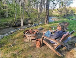  ?? COURTESY OF BLAKE GUTHRIE ?? All the cottages at Creekside Cottages in Blairsvill­e have private fire pits along Butternut Creek that runs through town.