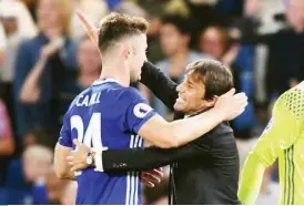  ??  ?? Chelsea manager Antonio Conte celebrates with defender Gary Cahill after their last win