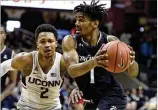  ?? JOHN WOIKE / HARTFORD COURANT ?? Cincinnati Bearcats guard Jacob Evans is a 6-6 forward who is fifth in school history in 3-point percentage.