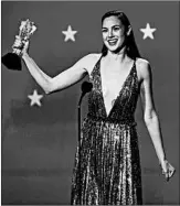  ?? CHRIS PIZZELLO/INVISION ?? “Wonder Woman” star Gal Gadot accepts the #SeeHer award Thursday at the Critics’ Choice Awards.