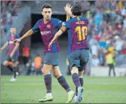  ?? FOTO: PEP MORATA ?? Munir, felicitado por Messi tras marcar el sábado