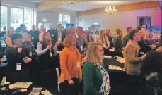  ?? a11AITCsum­mit03 ?? Delegates stood up to declare they were ‘Wild About Argyll’ at the behest of Marc Crothall of the Scottish Tourism Alliance.