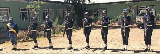  ??  ?? PRESENT ARMS: Aspirant Ethiopian police officers train at a facility which once hosted and provided military training for Nelson Mandela.