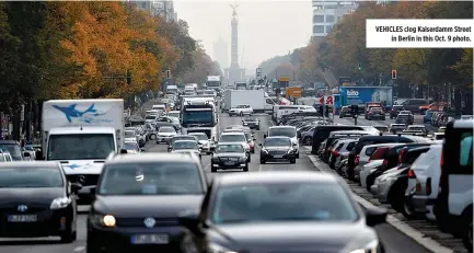  ??  ?? VEHICLES clog Kaiserdamm Street in Berlin in this Oct. 9 photo.