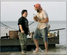  ??  ?? Zak (Zack Gottsagen) and Tyler (Shia Labeouf) develop an easy rapport as they travel together in the feel-good sensation The Peanut Butter Falcon.