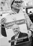  ?? FRANCOIS MORI THE ASSOCIATED PRESS ?? An activist holds a portrait reading "Friends of Khashoggi around the world" as part of a protest.