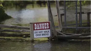  ?? RICK MADONIK/TORONTO STAR ?? The Toronto Islands flooding should stir discussion on the city’s plan for climate change, Edward Keenan writes.