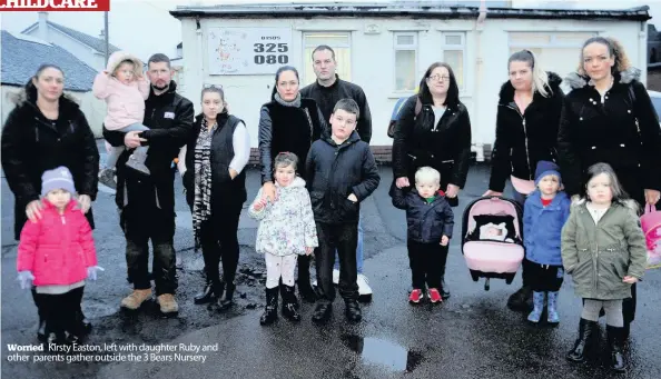  ??  ?? Worried Kirsty Easton, left with daughter Ruby and other parents gather outside the 3 Bears Nursery