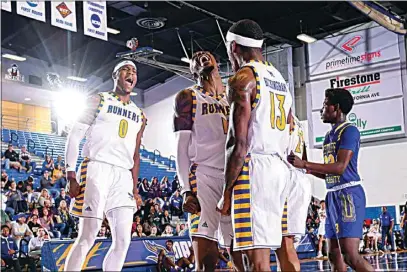  ?? PHOTO COURTESY OF CSUB ATHLETICS ?? CSUB players (from left) Ronne Readus, Taze Moore and De’Monte Buckingham celebrate a big play against Westcliff on Nov. 2. The trio is among seven seniors who have the option of retaining a year of eligibilit­y, be it at CSUB or elsewhere, following an NCAA ruling passed in October.