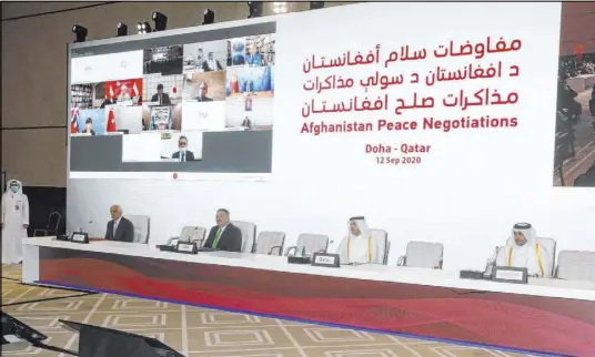  ?? Hussein Sayed The Associated Press ?? From left, U.S. envoy Zalmay Khalilzad, Secretary of State Mike Pompeo, and Sheikh Mohammed Bin Abdel Rahman Al-Thani and Mutlaq bin Majed al-Qahtani, of Qatar, attend the opening session Saturday of peace talks in Doha, Qatar.