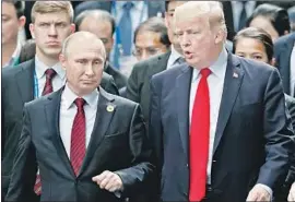  ?? Jorge Silva AFP/Getty Images ?? A WHITE HOUSE official said the leak about notes related to President Trump’s phone call to Russia’s Vladimir Putin “is a fireable offense and likely illegal.”