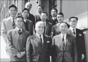  ?? ?? Jiang Zemin (first from right, second row) poses for a photograph in June 1964 with delegates on the sidelines of a meeting of the Internatio­nal Electrotec­hnical Commission in Aix-les-Bains, France.