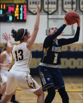  ?? MORNING JOURNAL FILE ?? Izzy Geraci of North Ridgeville, shown against Olmsted Falls last season, averaged 18.1 points per game in 2016-17 and his headed to Cleveland State next year.