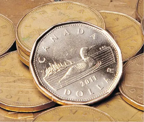  ?? JONATHAN HAYWARD/THE CANADIAN PRESS FILES ?? The loonie could get several boosts before year-end, says Scotiabank’s Shawn Osbourne. This includes the USMCA trade deal, which could be signed at the G20 Summit in Argentina this week and OPEC’s possible move to cut its output.