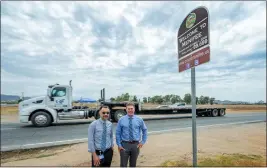  ?? ?? From left, Menifee planning staff Orlando Hernandez, planning manager, and Nick Fidler, Public Works director/city engineer, at Murrieta Road. Menifee sued Perris, its neighbor to the south in mid-july for “unlawful designatio­n” to remove Ethanac Road’s status.