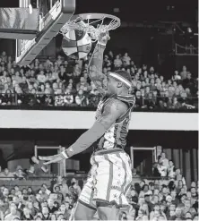  ?? Harlem Globetrott­ers ?? Thunder Law and the Harlem Globetrott­ers bring the Amazing Feats of Basketball World Tour to the Berry Center on Sunday.