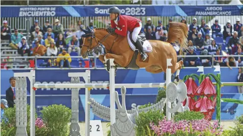  ?? ?? Kent Farrington (USA) and Landon win the jumping individual silver medal medal in Chile.